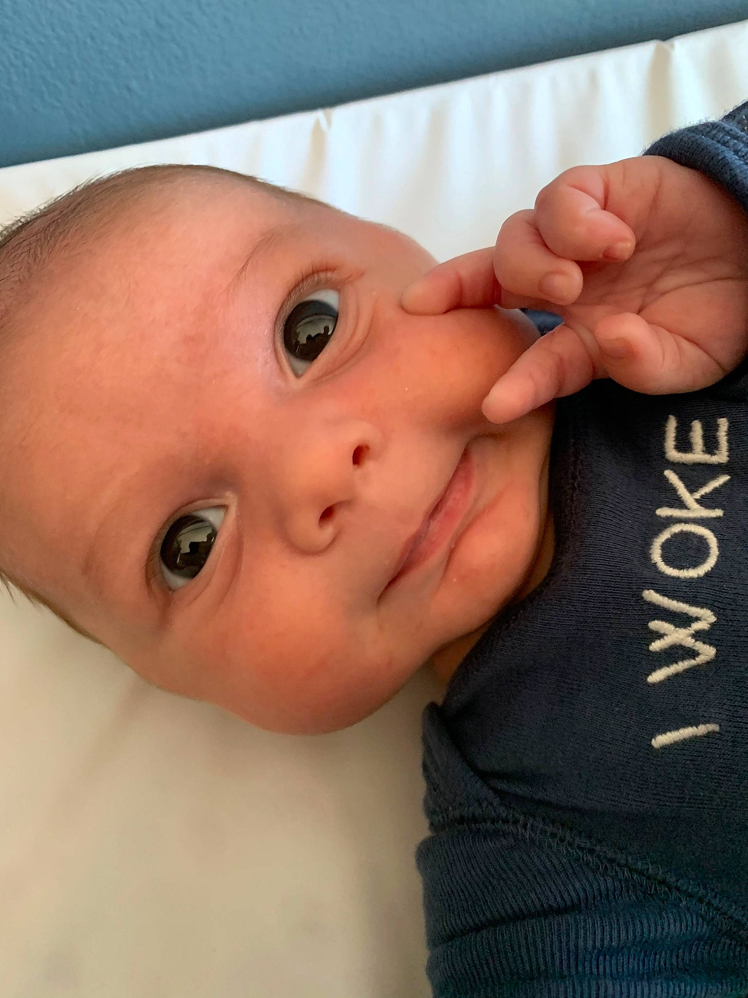 Peter John is registered to the contest to win money with this photo: arm, baby, cheek, child, chin, ear, eye, eyebrow, face, finger, forehead, hand, head, lip, mouth, muscle, nose, organ, person, skin