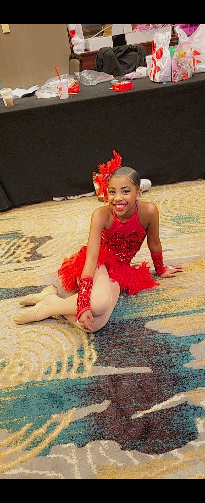 Angel is registered to the contest to win money with this photo: abdomen, barefoot, dancer, entertainment, event, face, fashion_design, flooring, fun, happy, headpiece, human_leg, jewellery, joy, leisure, performance_art, performing_arts, person, smile, sportswear