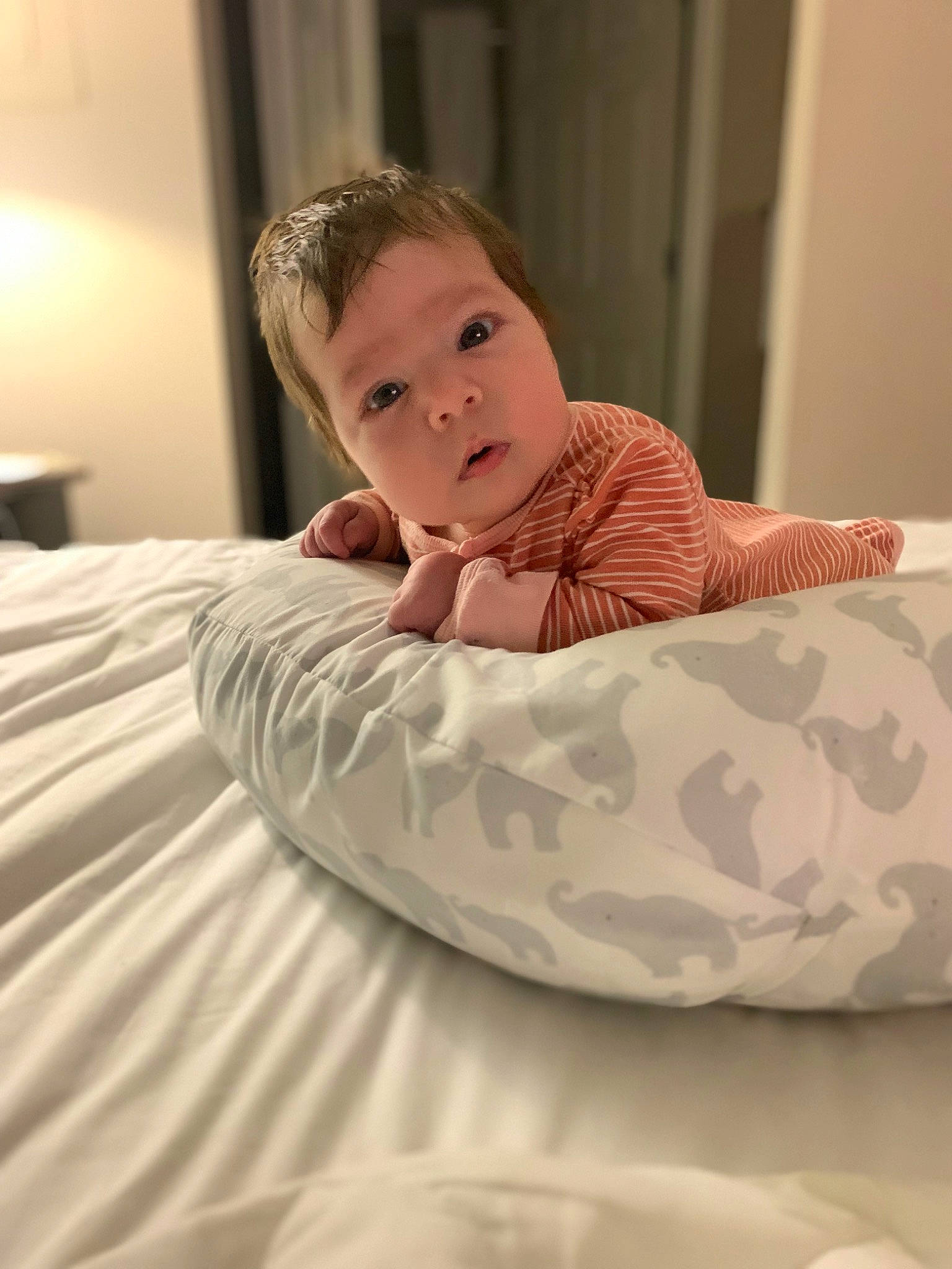 Lana joined the competition — help win amazing prizes! baby, baby_toddler_clothing, bed, bedding, child, comfort, eyebrow, face, flash_photography, floor, flooring, fun, linens, person, room, sitting, skin, sleeve, textile, toddler