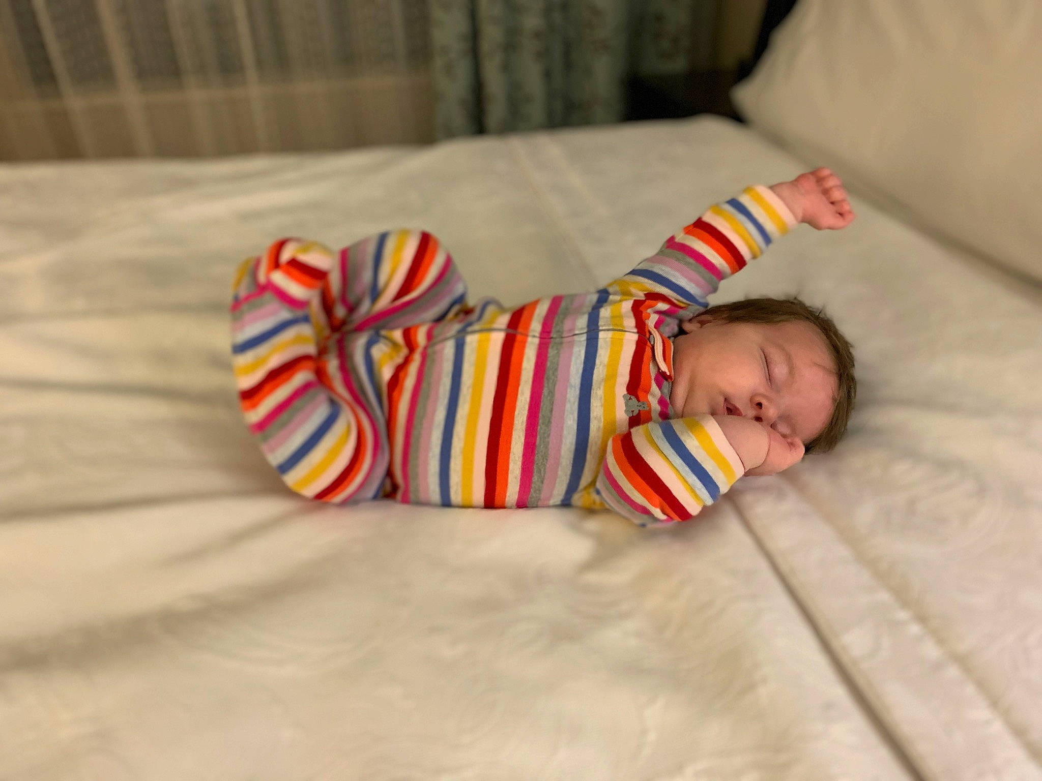 Lana is registered to the contest to win money with this photo: baby, baby_products, baby_sleeping, baby_toddler_clothing, bedtime, carmine, child, comfort, flooring, foot, hand, hardwood, head, linens, nap, pattern, person, room, sleep, toddler