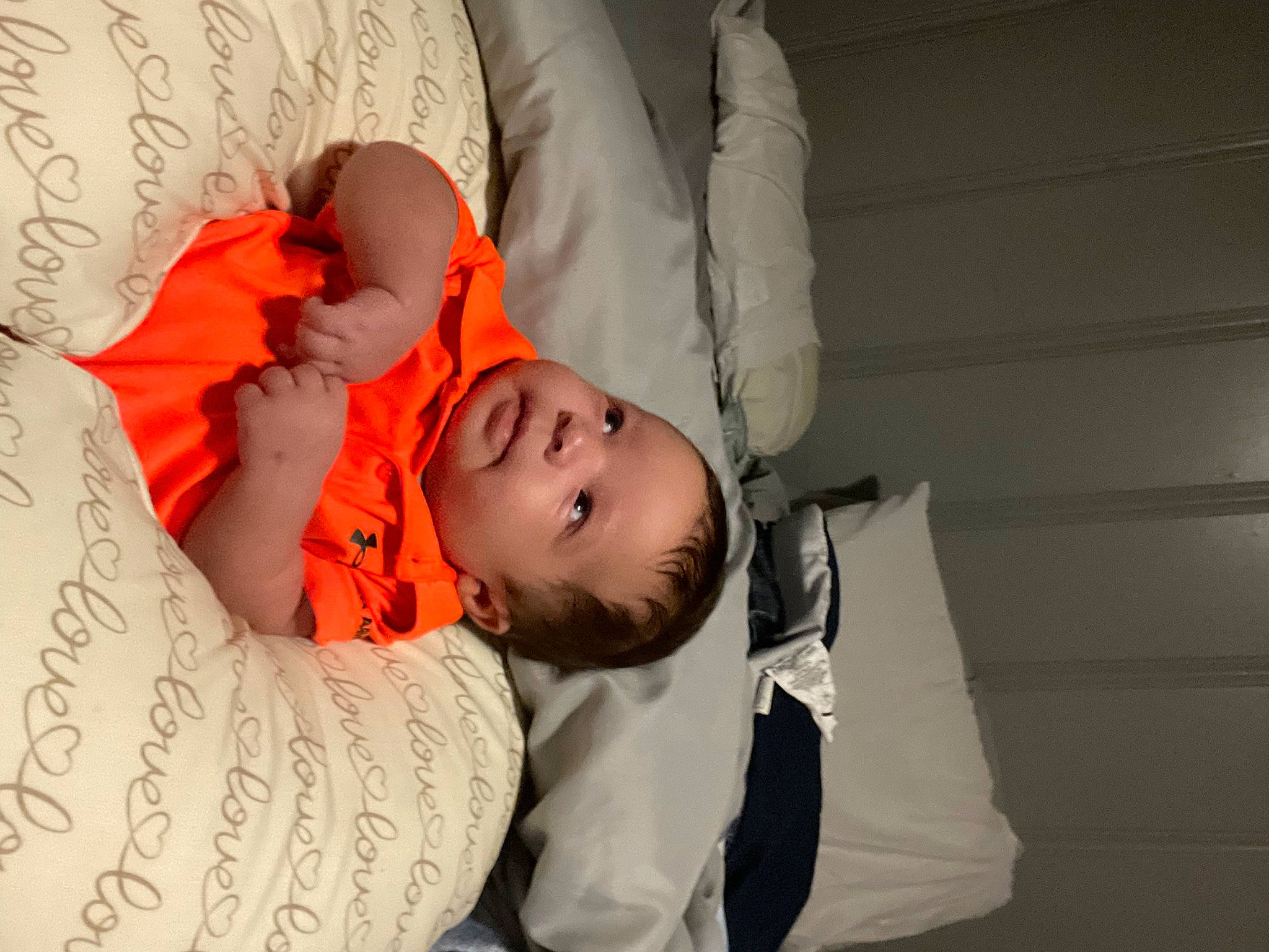 Adrian is registered to the contest to win money with this photo: baby, baby_products, baby_sleeping, baby_toddler_clothing, bedding, bedtime, child, comfort, facial_expression, finger, flash_photography, linens, mouth, nap, person, room, sitting, skin, sleep, sleeve