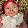 Azalea Charlotte joined the competition — help win amazing prizes! baby, infant, smiling, headband, leopard_print, cushion, white_clothing, drool, cute, portrait, closeup, pink, patterned, child, happy, furniture, indoor, person, baby_clothes, headwear