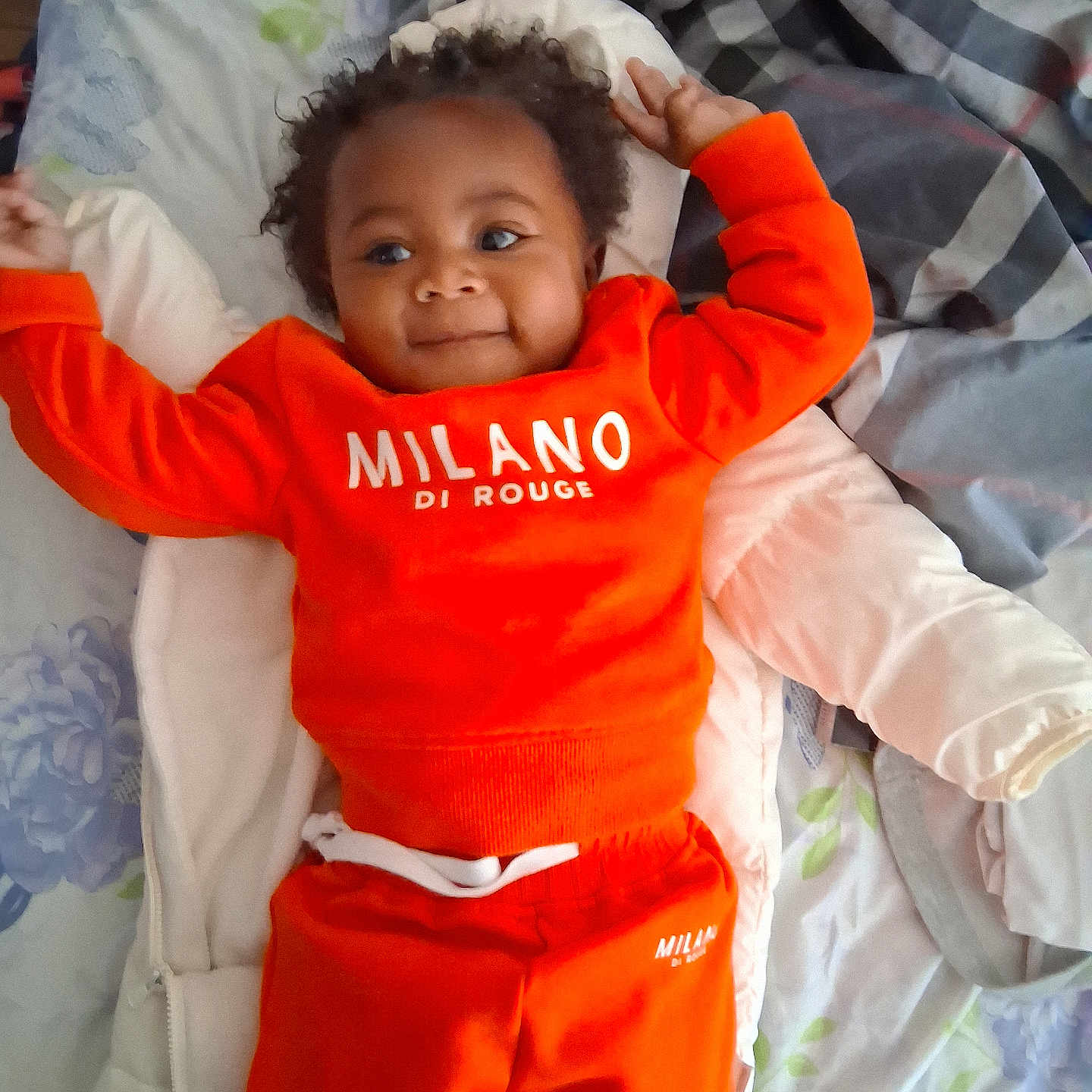 Lula'Rose is registered to the contest to win money with this photo: baby, bed, bedroom, bodypart, clothing, couch, cushion, face, finger, furniture, hand, happy, head, homedecor, indoors, pants, person, photography, portrait, room