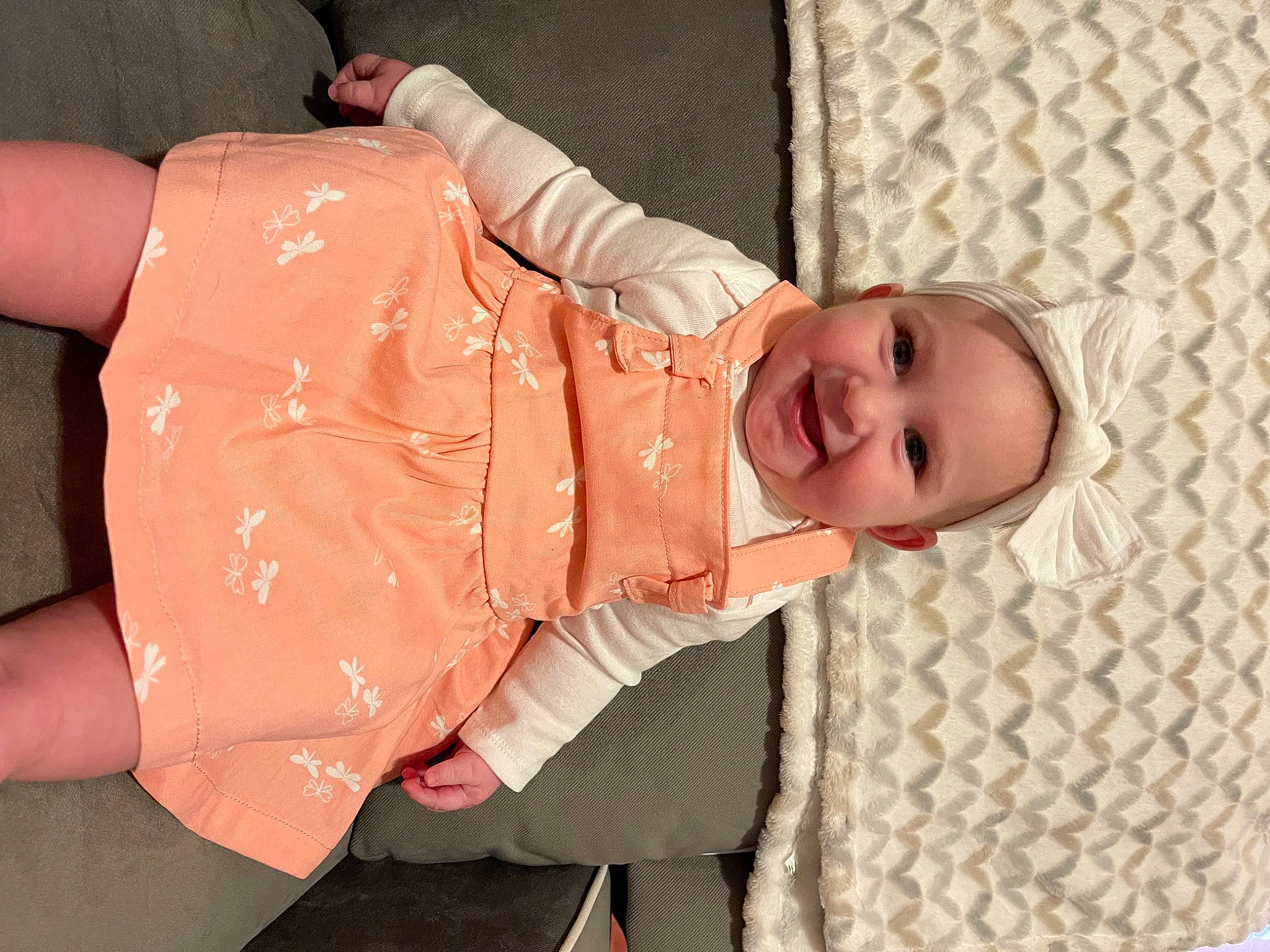 Cambrie joined the competition — help win amazing prizes! abdomen, baby, baby_laughing, baby_products, baby_safety, baby_toddler_clothing, child, comfort, face, fun, happy, headwear, joy, pattern, peach, person, pink, skin, sleeve, smile