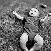 Christian joined the competition — help win amazing prizes! baby, infant, child, onesie, dinosaur, carpet, black_and_white, cute, chubby, lying_down, arms_outstretched, clothing, expression, indoor, texture, soft, portrait, humor, young, person