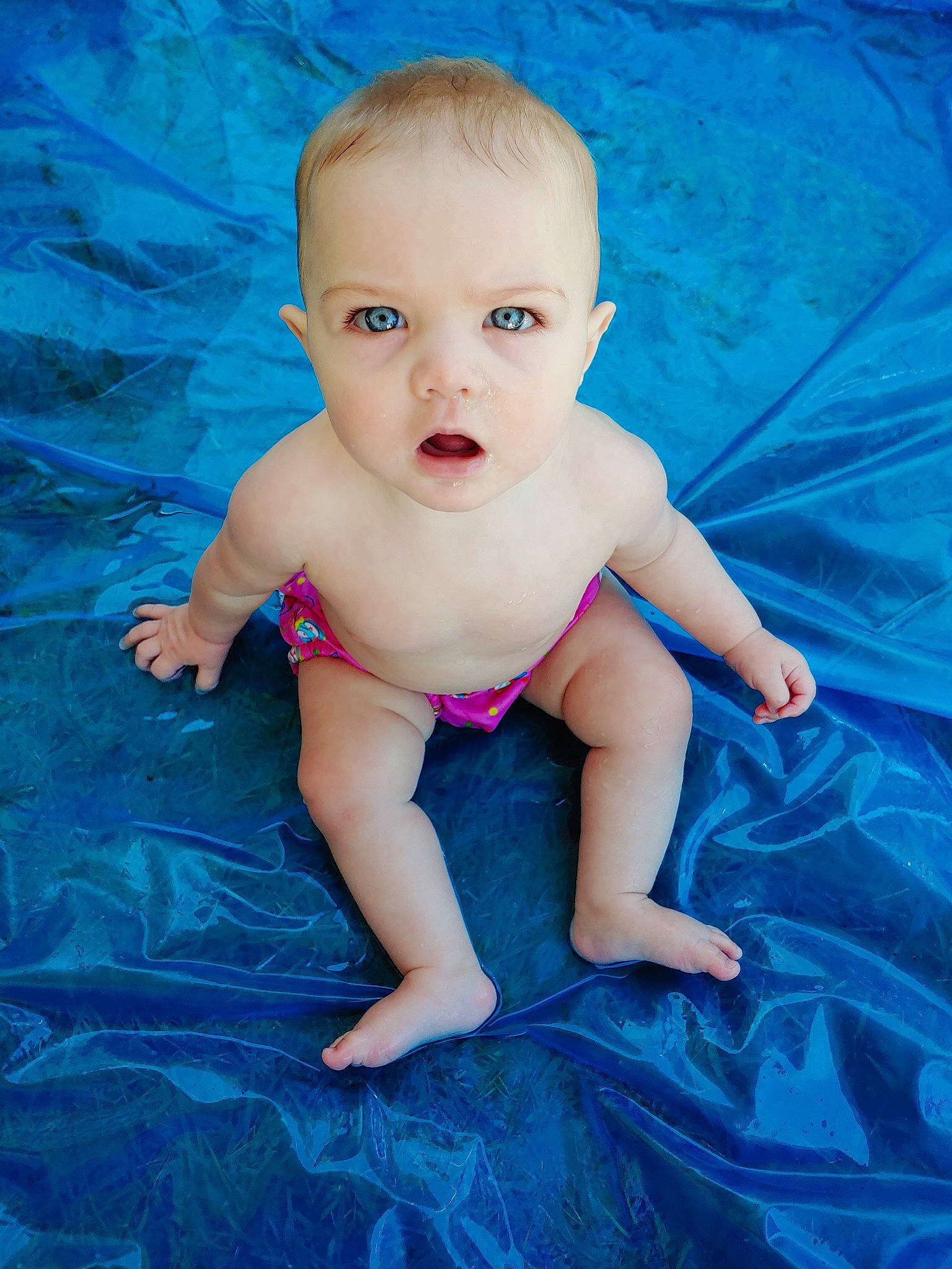 Dani is registered to the contest to win money with this photo: baby, baby_products, blue, cheek, child, eye, face, fun, head, leg, leisure, person, photography, pink, product, recreation, skin, smile, toddler