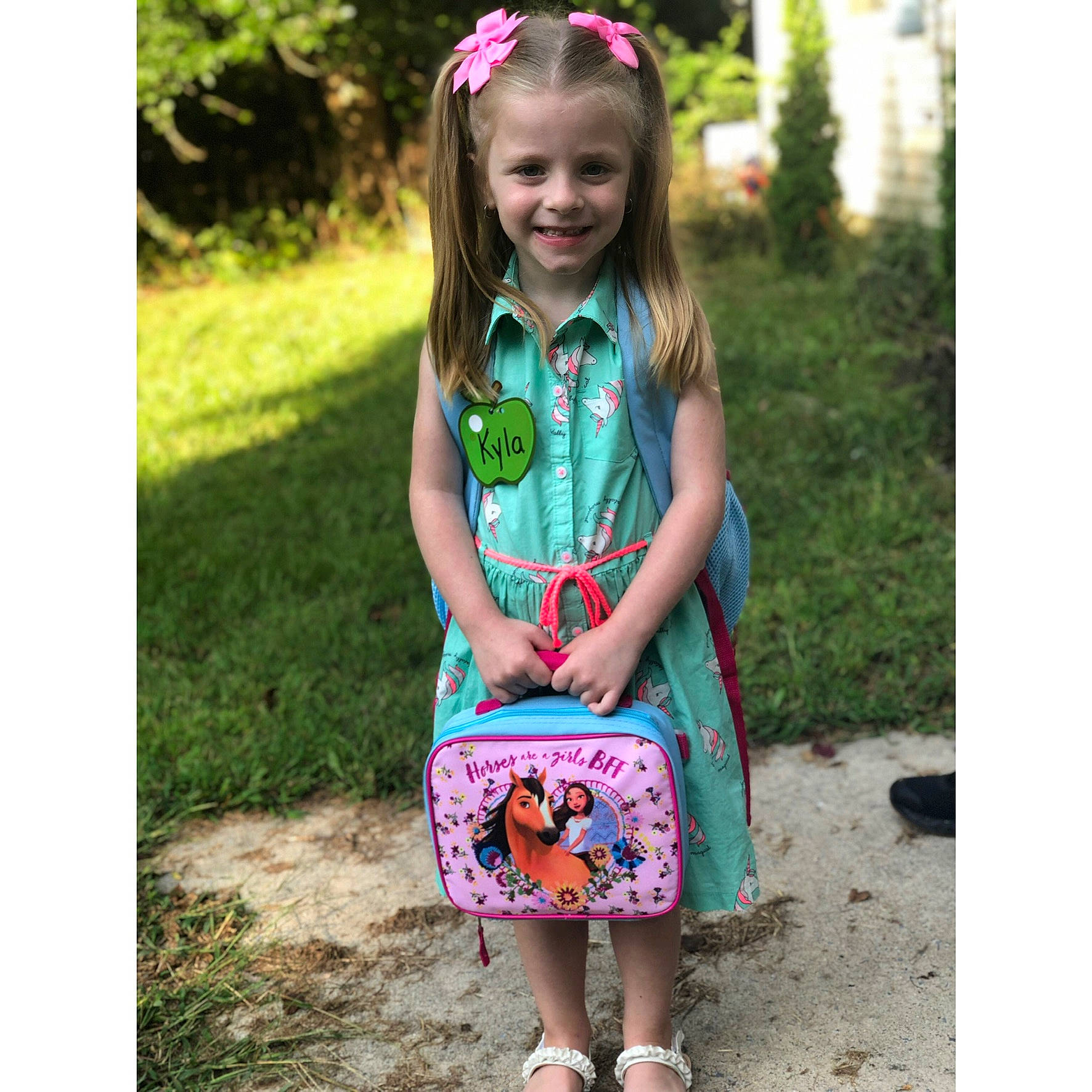 Kyla is registered to the contest to win money with this photo: baby_products, baby_toddler_clothing, child, clothing, dress, fashion_accessory, hair_accessory, headband, joy, pattern, person, plant, play, product, summer, t_shirt, toddler, turquoise, violet