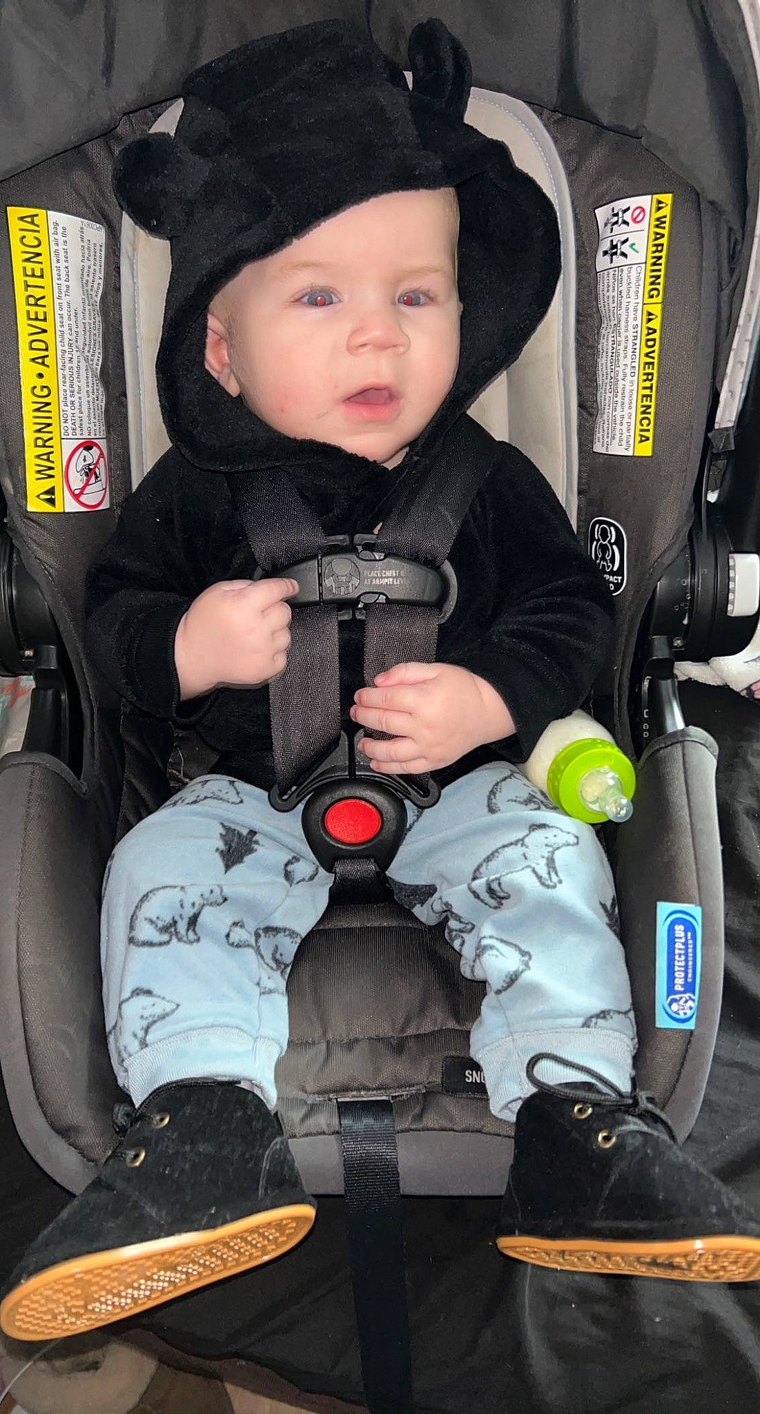 Austin is registered to the contest to win money with this photo: auto_part, baby, baby_carriage, baby_products, baby_safety, baby_toddler_clothing, bag, car_seat, carmine, child, comfort, fashion_accessory, hat, headwear, lap, person, personal_protective_equipment, product, seat_belt, service