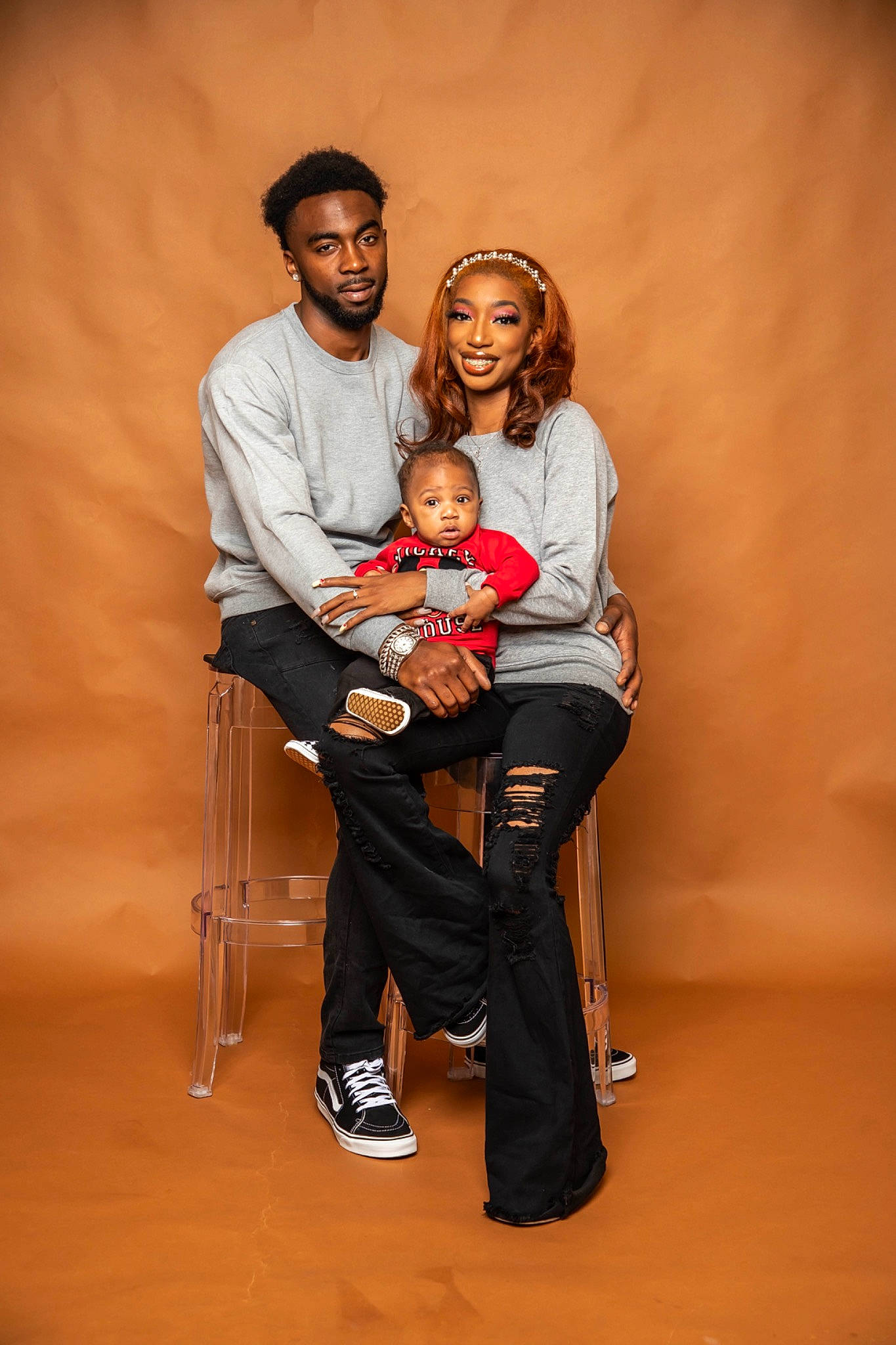 Tony is registered to the contest to win money with this photo: baby, beard, chair, comfort, couch, entertainment, event, facial_hair, flash_photography, fun, gesture, hair, happy, human_body, joy, leg, performing_arts, person, sitting, smile
