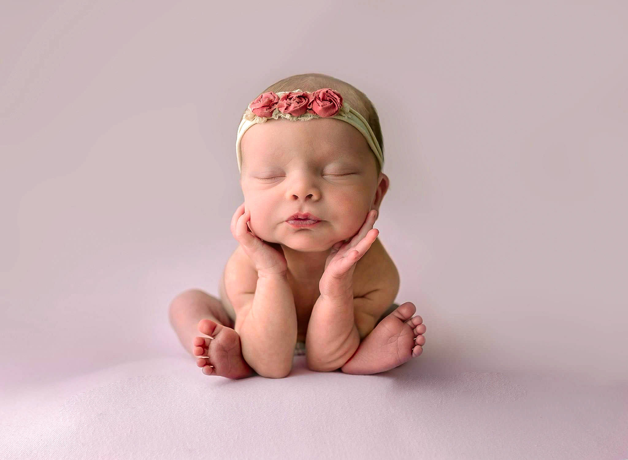Raelynn is registered to the contest to win money with this photo: arm, baby, baby_toddler_clothing, barefoot, carmine, comfort, eye, face, foot, gesture, happy, head, headwear, human_body, human_leg, leg, nail, person, sitting, smile