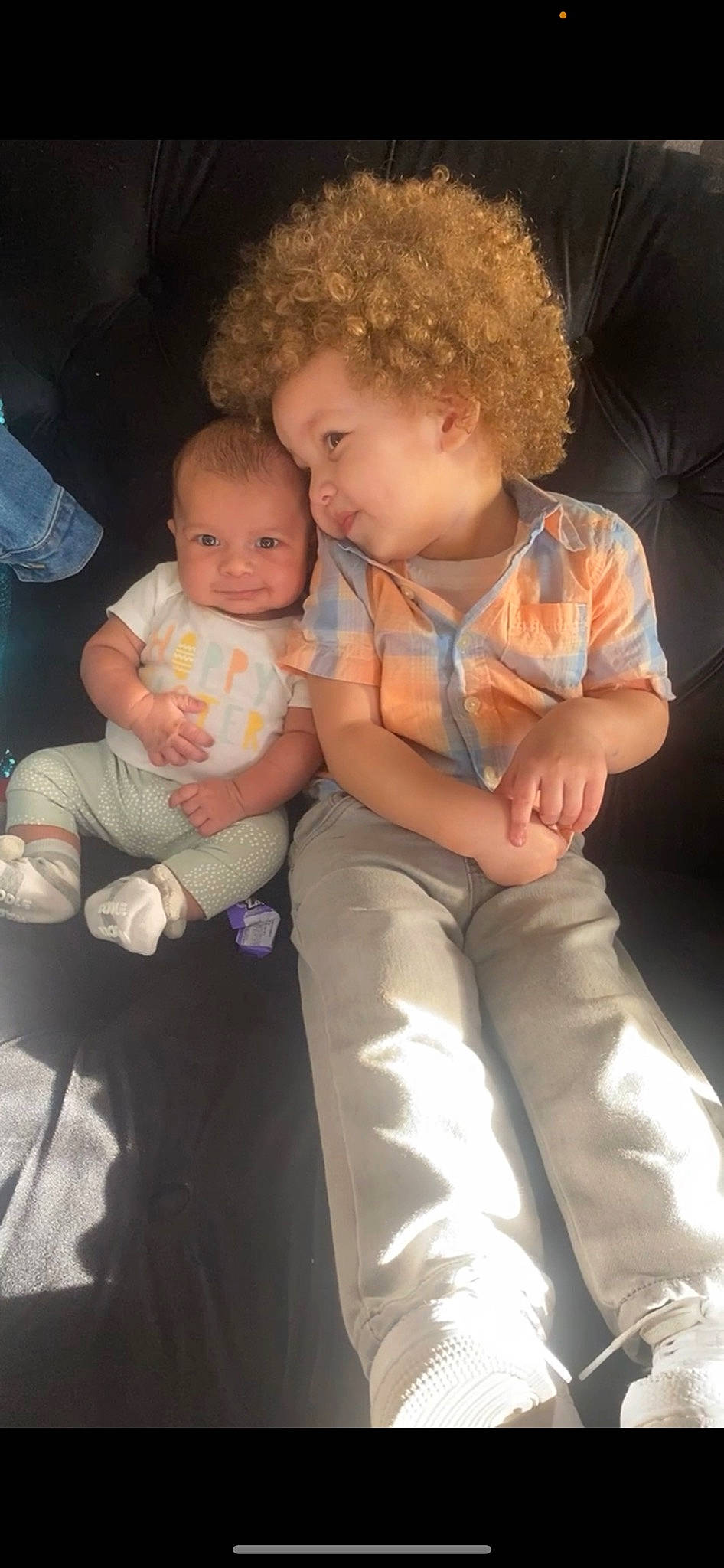 Elijah is registered to the contest to win money with this photo: baby, baby_toddler_clothing, cheek, child, comfort, event, eye, finger, fun, gesture, happy, head, lap, mouth, nose, person, sitting, skin, smile, toddler