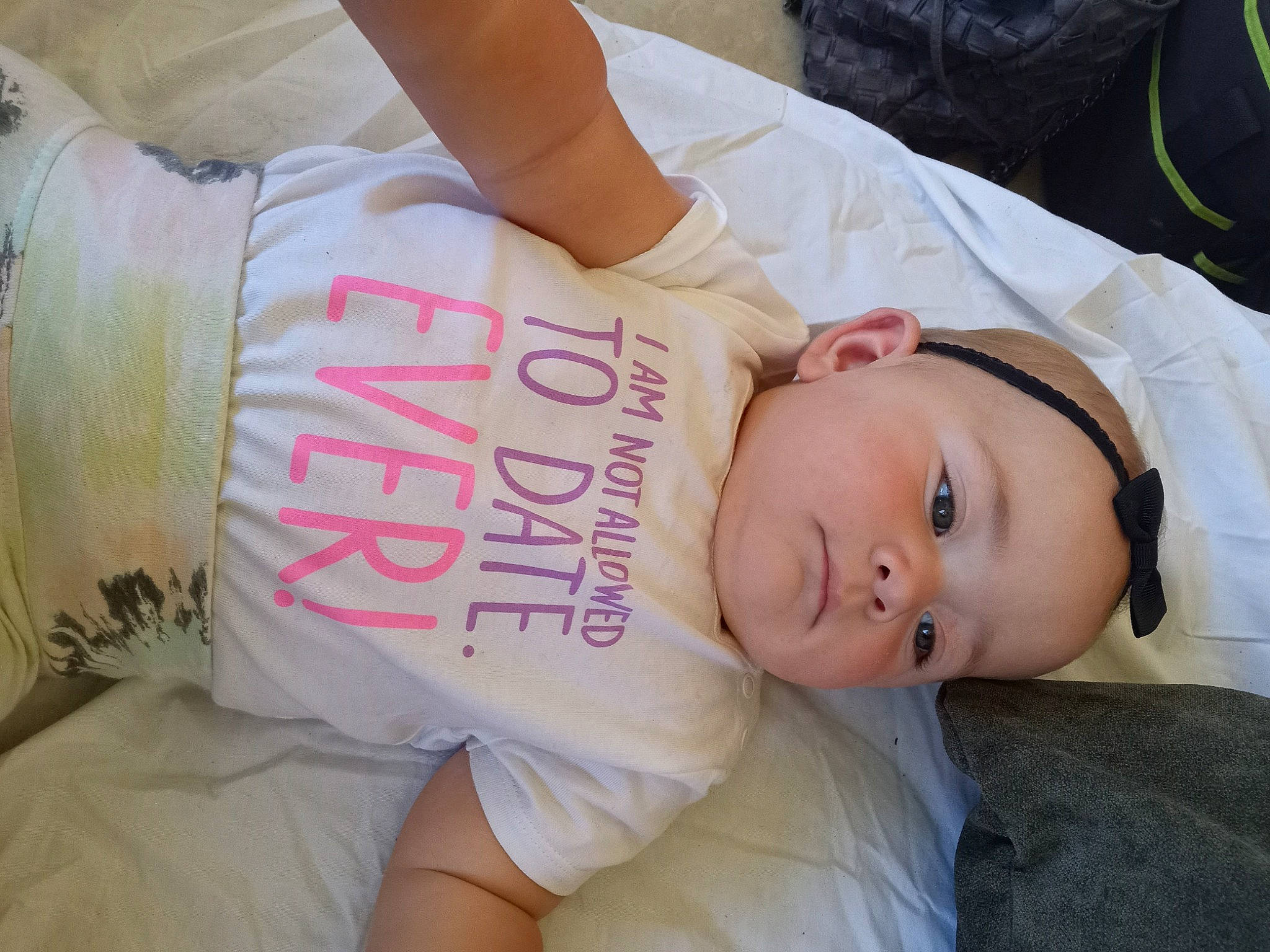 Skyla is registered to the contest to win money with this photo: baby_toddler_clothing, cheek, child, comfort, eyelash, finger, hand, happy, hat, joint, mammal, nail, person, pink, product, skin, sleeve, t_shirt, textile, toddler