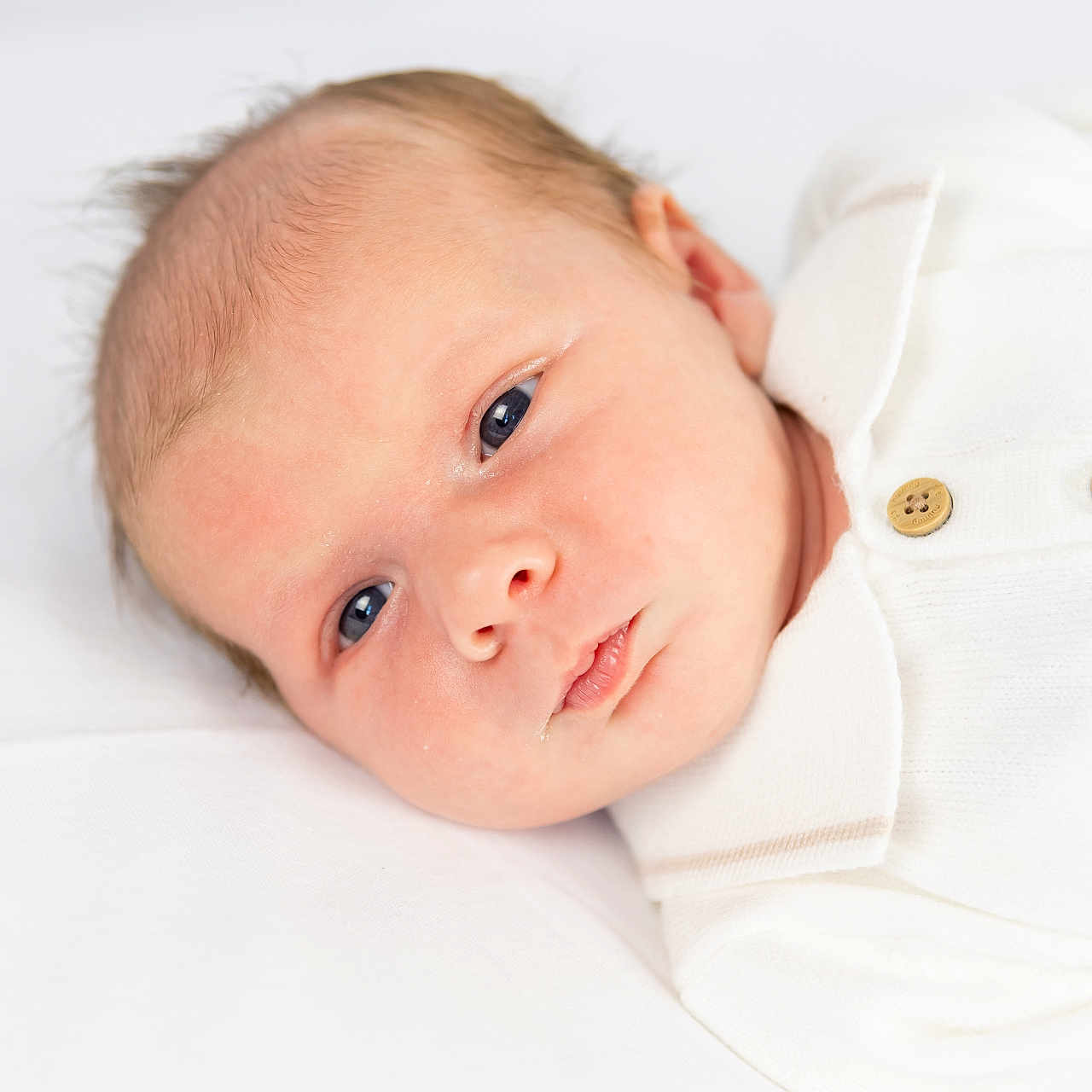 Bobby joined the competition — help win amazing prizes! baby, blanket, bodypart, face, finger, hand, happy, head, newborn, person, photography, portrait, sleeping, smile