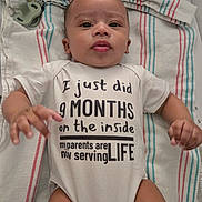 Onyx joined the competition — help win amazing prizes! baby, infant, onesie, text, blanket, striped, pacifier, hospital, bed, lying_down, cute, child, person, skin, face, hand, clothing, newborn, expression, indoor