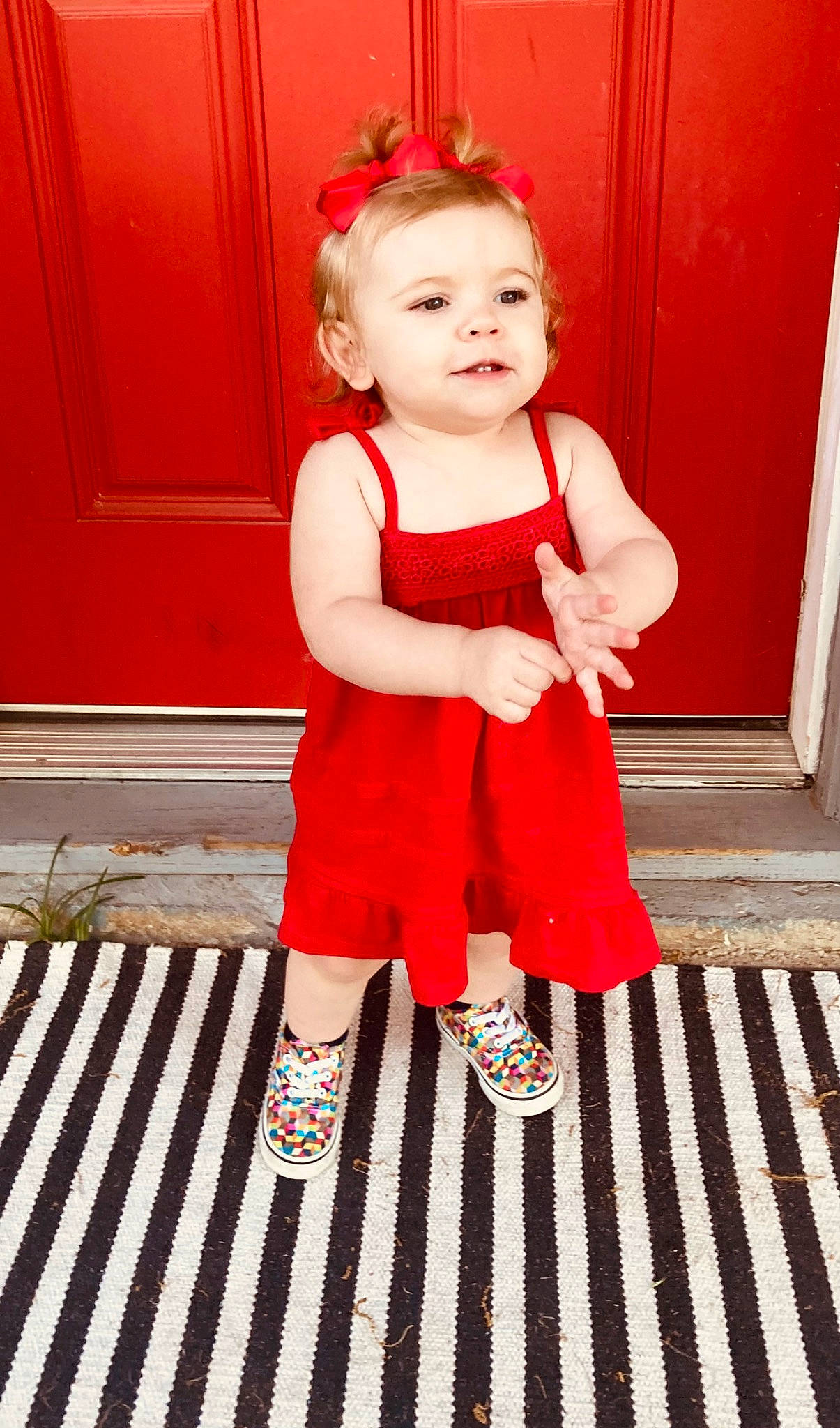 Rhyder is registered to the contest to win money with this photo: baby, baby_toddler_clothing, child, day_dress, door, dress, event, face, flooring, happy, magenta, pattern, person, pink, red, sitting, sleeve, smile, toddler, white