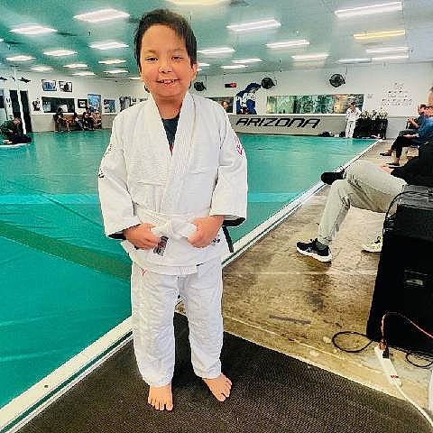 Ricky joined the competition — help win amazing prizes! bag, contact_sport, cool, event, flooring, fun, japanese_martial_arts, joint, joy, leisure, luggage_and_bags, martial_arts_uniform, person, recreation, room, shoulder, sleeve, smile, sportswear, standing