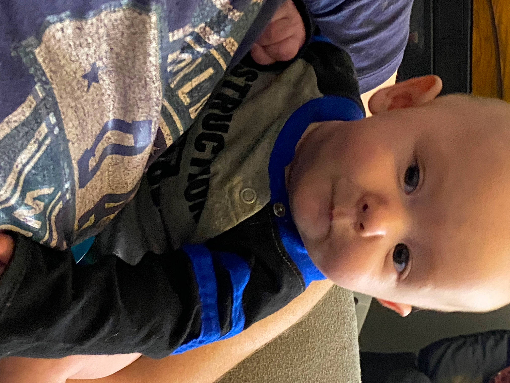 Jonathan is registered to the contest to win money with this photo: baby, baby_toddler_clothing, child, elbow, electric_blue, fun, grass, happy, hat, leisure, mammal, nose, person, sitting, smile, toddler, vertebrate