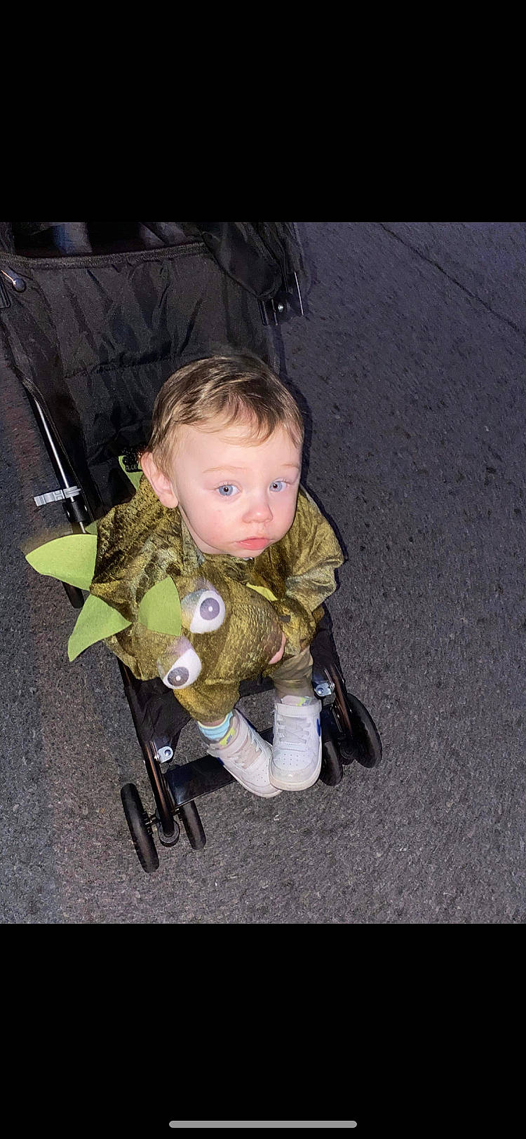 Elijah joined the competition — help win amazing prizes! baby, baby_carriage, baby_products, chair, cheek, child, darkness, eye, flooring, fun, grass, person, personal_protective_equipment, sitting, skin, toddler, wheel