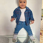 Medeea a rejoint le concours — aidez-le/la à gagner de superbes lots ! toddler, child, denim_jacket, jeans, white_shirt, headband, cherry_pattern, sneakers, glass_table, reflection, home_interior, kitchen, floor_tiles, smiling, posing, cosmetic_item, person, indoor, cute, fashion