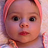 baby, baby_girl, child, close_up, clothing, curious_expression, cute, eyelashes, face, headband, headwear, indoors, infant, person, pink, portrait, skin, soft_blanket, wide_eyes, young