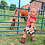 Nina joined the competition — help win amazing prizes! animal, backyard, boots, bow, child, curly_hair, cute, daylight, fence, grass, greenery, house, outdoor, person, pet, pink_shirt, pony, rural, skirt, toddler