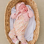 Ruby Mae joined the competition — help win amazing prizes! baby, sleeping, basket, blanket, pink, headband, onesie, cardigan, infant, cute, resting, soft, woven, newborn, peaceful, portrait, indoors, child, cozy, adorable