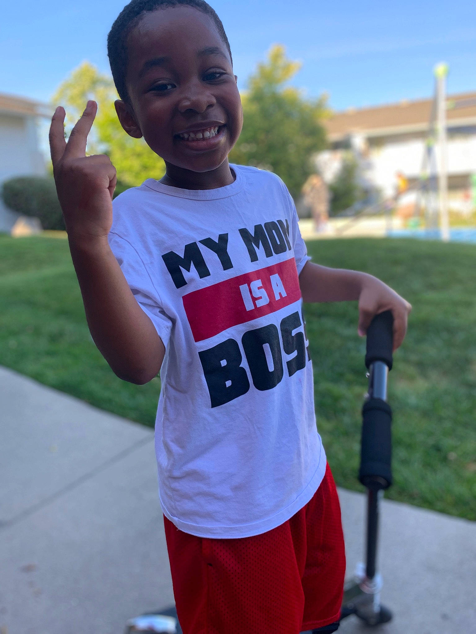 Jae is registered to the contest to win money with this photo: electric_blue, finger, gesture, grass, happy, jersey, joy, leisure, person, plant, player, recreation, shorts, shoulder, sky, sleeve, smile, sports_equipment, sports_uniform, sportswear