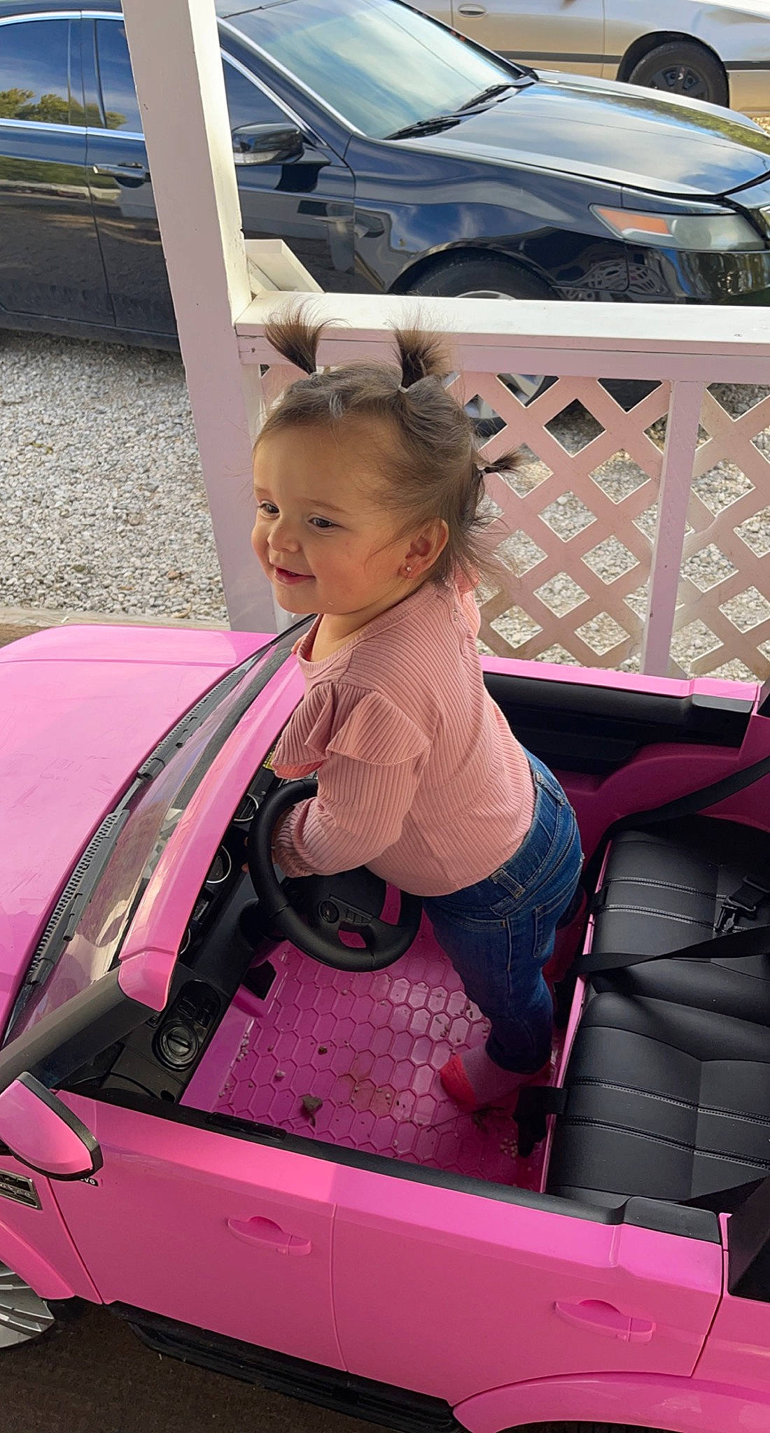 Aliana is registered to the contest to win money with this photo: auto_part, automotive_design, automotive_exterior, automotive_wheel_system, automotive_window_part, bumper, car, fun, hood, leisure, magenta, motor_vehicle, person, personal_luxury_car, pink, shorts, thigh, toddler, vehicle, vehicle_door