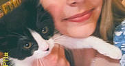 Mila joined the competition — help win amazing prizes! animal, black_and_white, blonde_hair, casual, cat, closeup, cute, face, feline, happy, holding, indoor, love, necklace, person, pet, portrait, smile, woman, young_adult