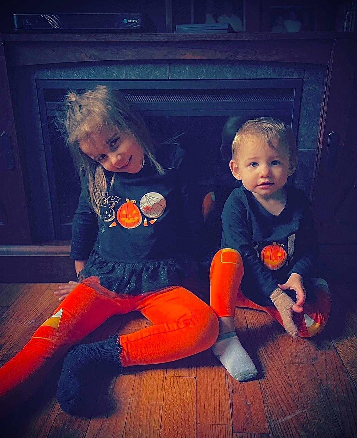 Enslee is registered to the contest to win money with this photo: baby, baby_toddler_clothing, cloud, cool, flash_photography, floor, flooring, fun, happy, human_body, interaction, joy, lap, leg, mouth, orange, person, sky, t_shirt, tints_and_shades