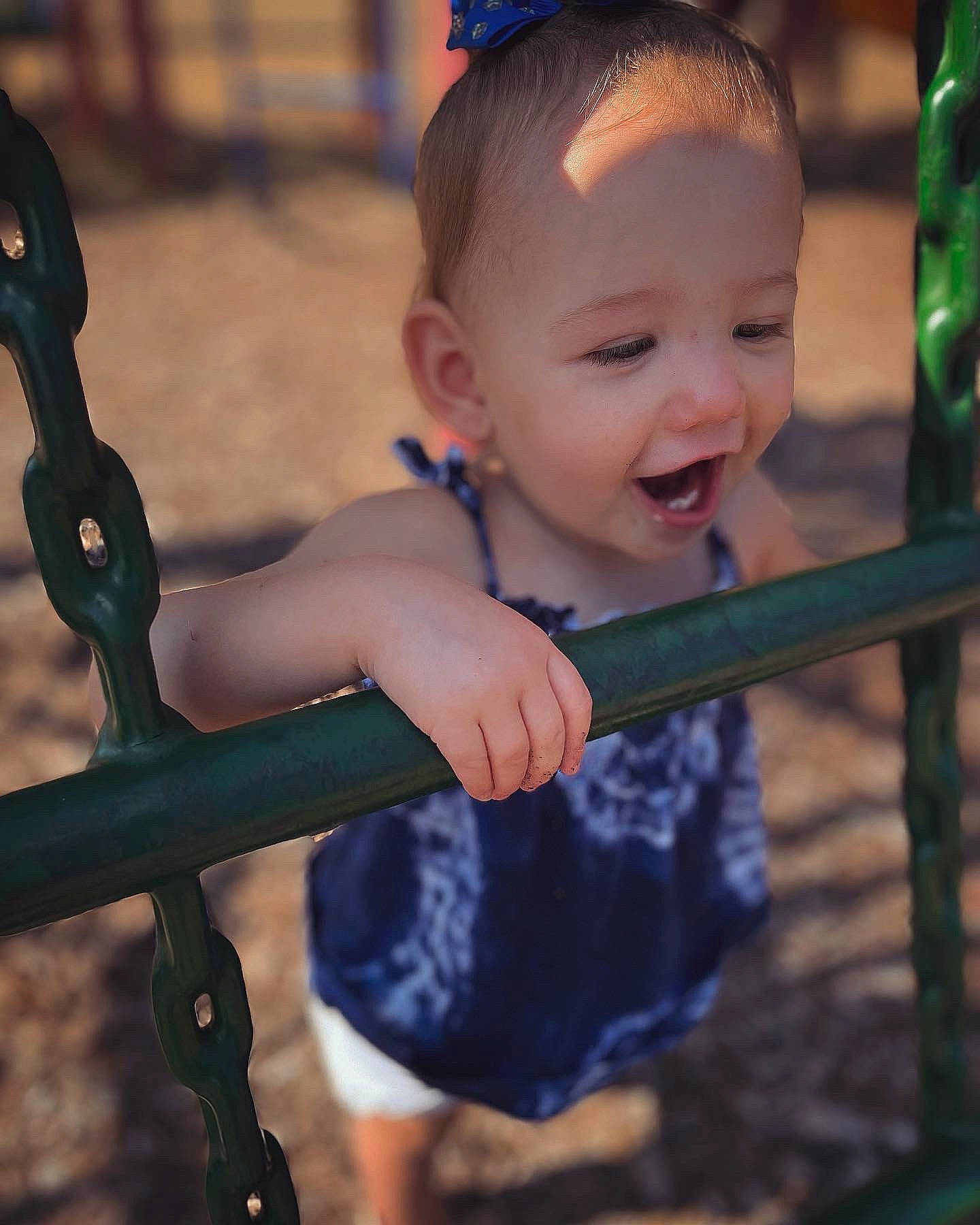 Enslee joined the competition — help win amazing prizes! black, chin, eye, facial_expression, green, hair, hand, happy, head, human_body, lip, nose, person, photograph, plant, product, skin, smile, standing, swing