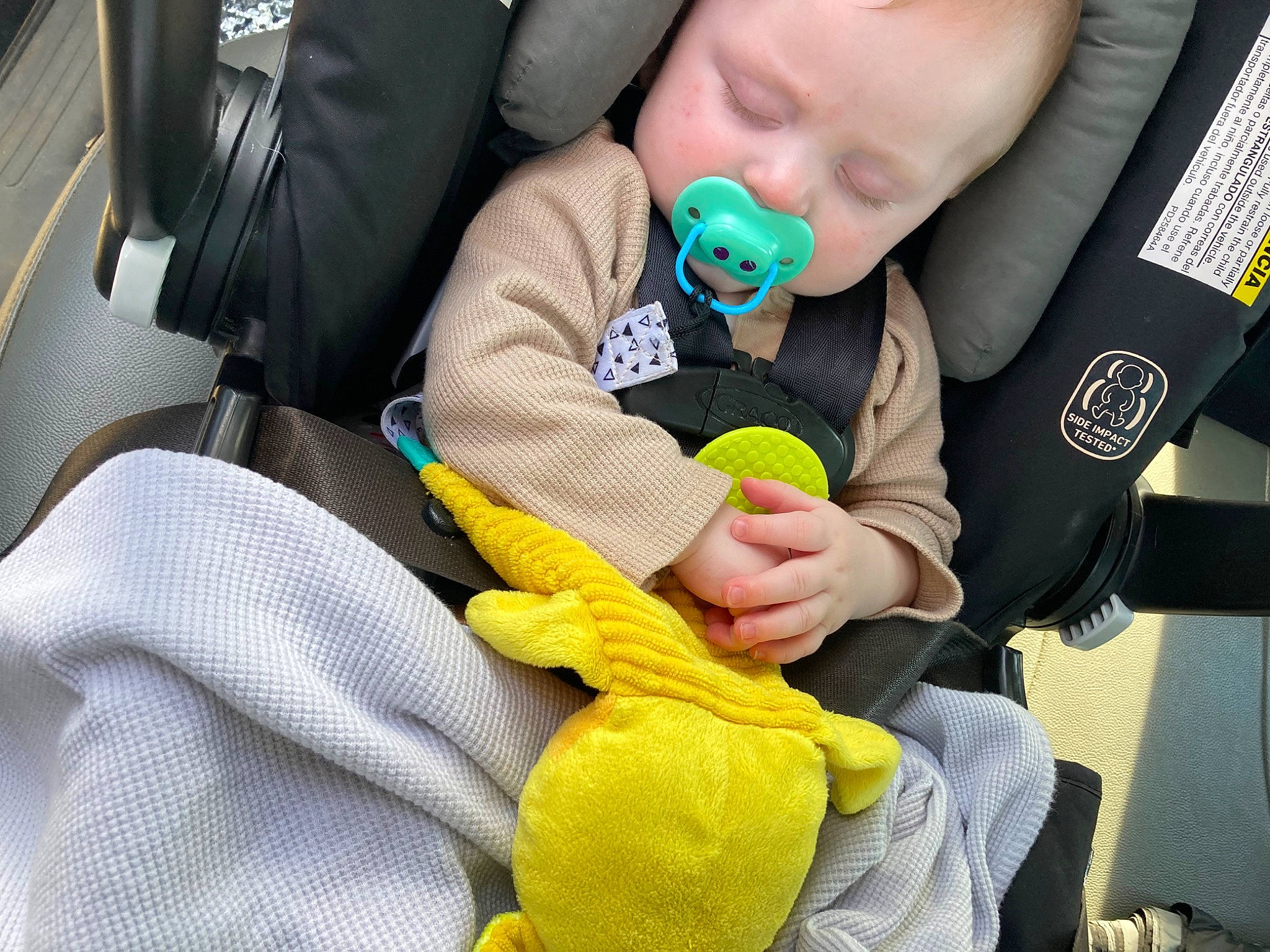 Silas is registered to the contest to win money with this photo: auto_part, baby, baby_carriage, baby_in_car_seat, baby_products, baby_toddler_clothing, car_seat, car_seat_cover, child, comfort, family_car, finger, gesture, head_restraint, nail, person, seat_belt, sitting, steering_wheel, thumb