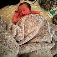 Jaxx joined the competition — help win amazing prizes! baby, blanket, child, comfort, cozy, cute, face, head, indoors, infant, mattress, newborn, peaceful, person, pillow, relaxation, resting, skin, sleeping, soft_texture