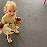 Lily is registered to the contest to win money with this photo: baby, blonde_hair, candid, carpet, chair, child, dolls, dress, fashion, female, happy, indoors, playroom, portrait, shoes, smiling, toddler, toy, walking, 幼児