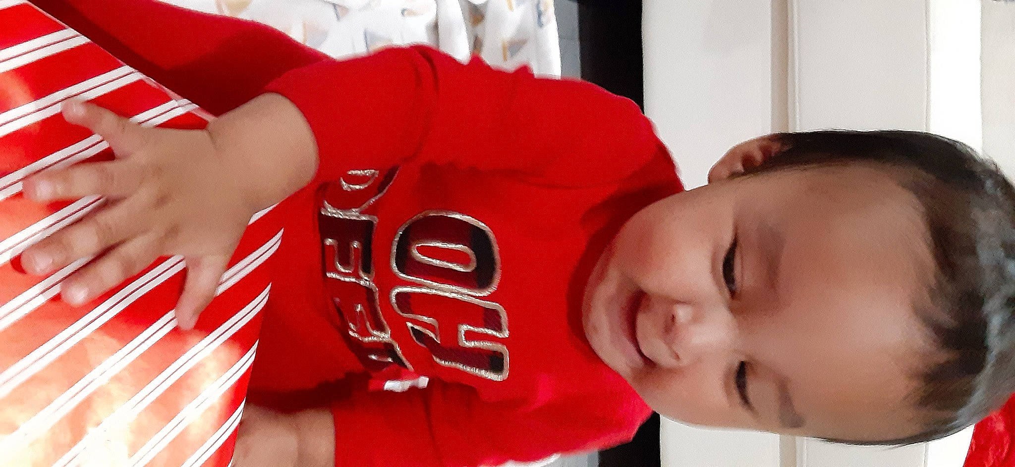 Jesus joined the competition — help win amazing prizes! baby, baby_toddler_clothing, carmine, cheek, cheerleading_uniform, child, chin, cool, eyebrow, facial_expression, forehead, jersey, lip, muscle, person, red, skin, sleeve, sports_jersey, sportswear