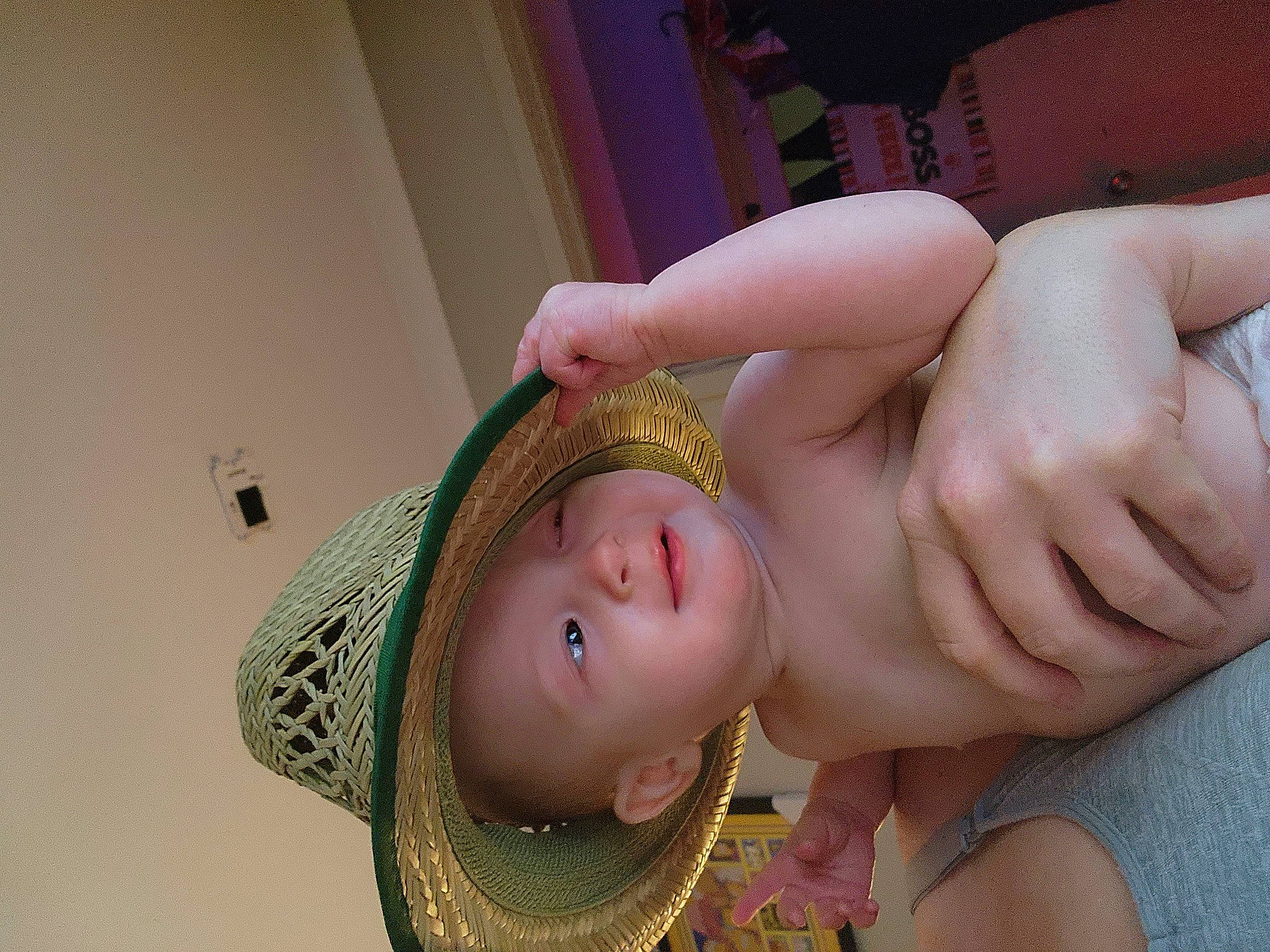 Clayton is registered to the contest to win money with this photo: baby, brown_hair, chest, ear, eye, eyelash, fashion_accessory, fun, hair_accessory, happy, headgear, headpiece, jaw, lip, nail, nose, person, pink, skin, sun_hat