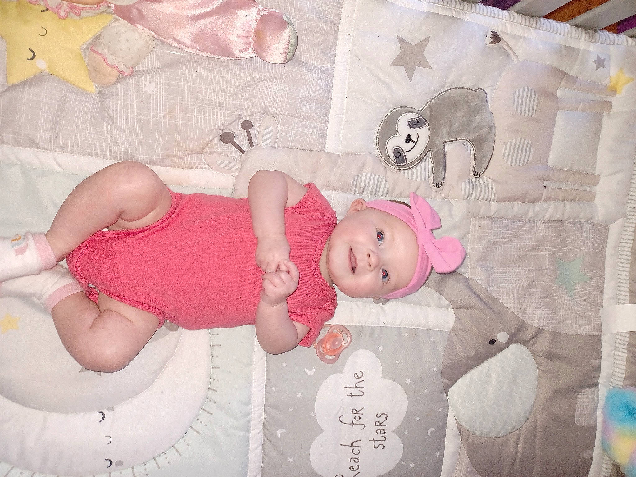 Myah joined the competition — help win amazing prizes! baby, baby_products, baby_toddler_clothing, baby_toys, bed, bedding, bedtime, cheek, child, comfort, headwear, human_leg, infant_bed, linens, pattern, person, pink, room, sock, thigh