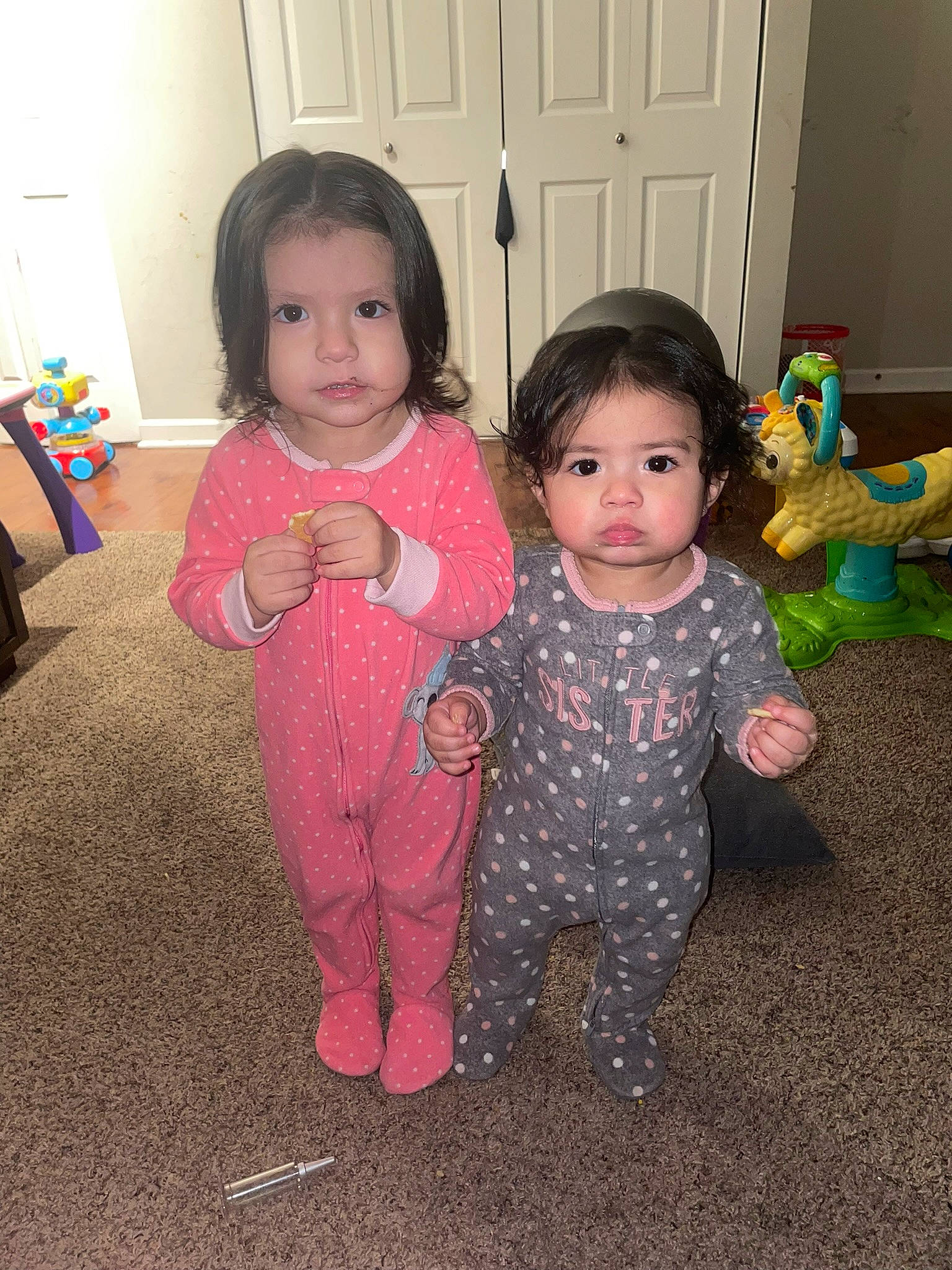 Ariana Layla is registered to the contest to win money with this photo: baby, baby_toddler_clothing, cheek, eye, face, floor, flooring, happy, head, human_body, iris, joint, leg, mammal, nose, person, pink, skin, sleeve, standing