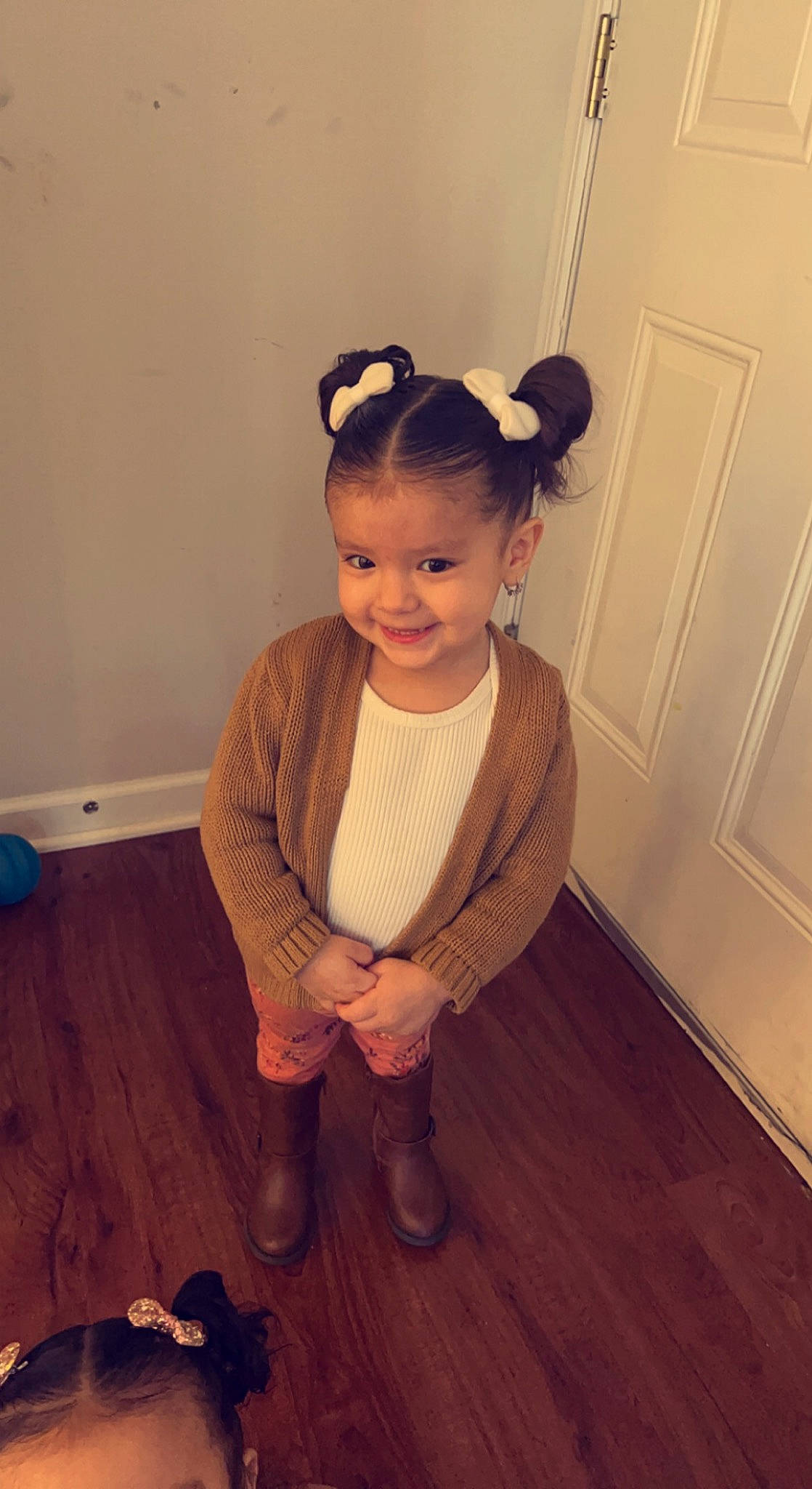 Analiyah Everly joined the competition — help win amazing prizes! baby_toddler_clothing, door, eye, floor, flooring, fun, happy, hardwood, human_body, joy, laminate_flooring, leg, person, shoe, shoulder, sleeve, smile, toddler, varnish, wood