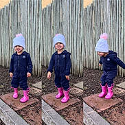 Aayla-Louise is registered to the contest to win money with this photo: toddler, child, outdoor, playful, pink_boots, navy_jumpsuit, white_hat, pom_pom, wooden_fence, smiling, happy, cute, posing, playground, ground, sidewalk, nature, seasonal_clothing, fun, portrait