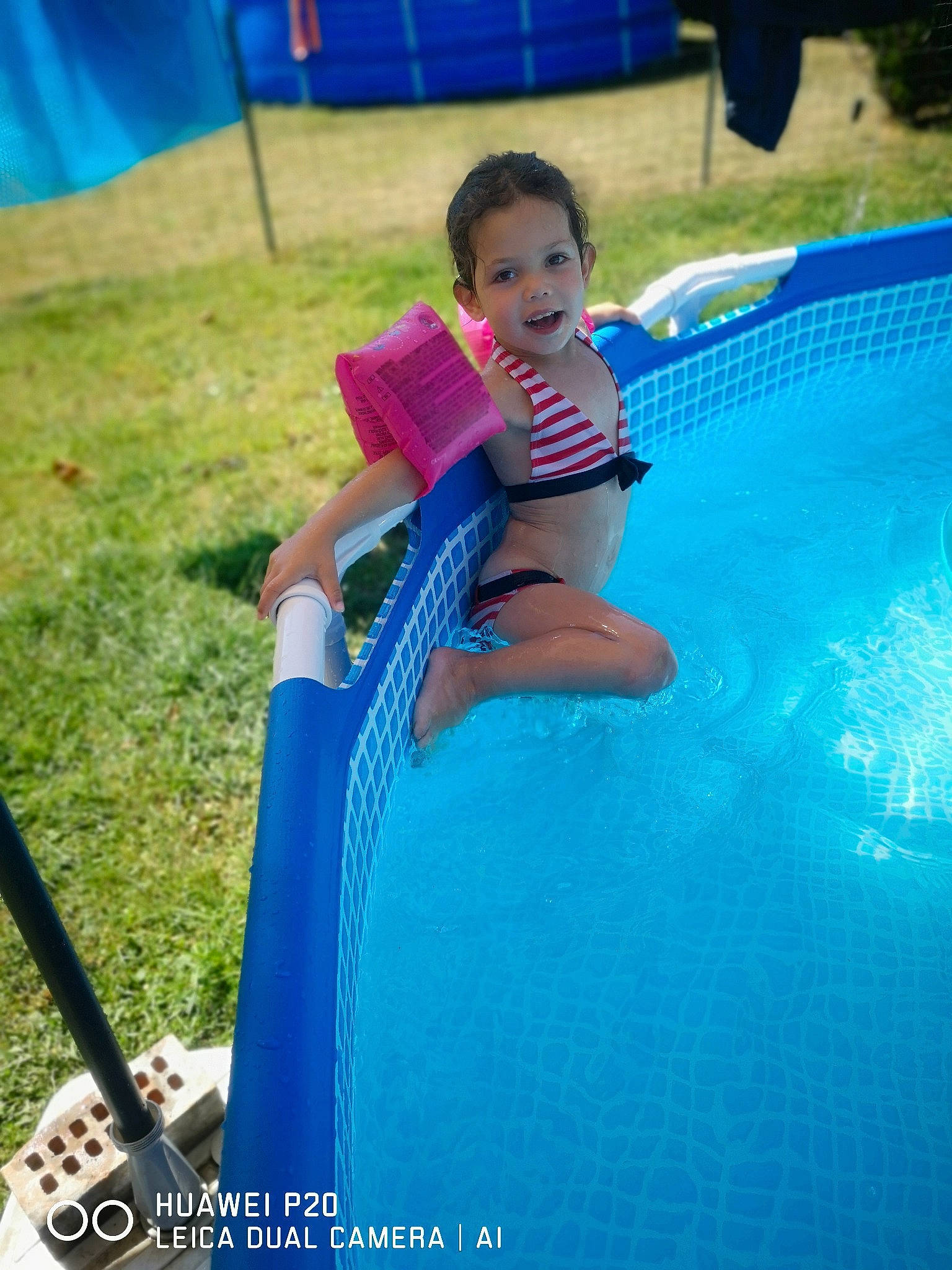 Shanna participe au concours pour gagner de l'argent avec cette photo : child, fun, games, leisure, park, person, play, playground, playground_slide, recreation, smile, summer, swimming_pool, toddler, vacation, water, water_park