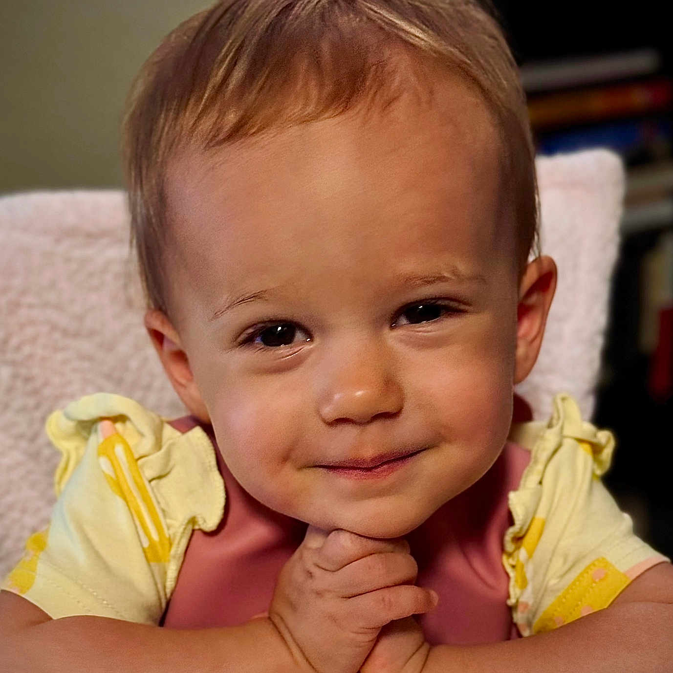 Sofia is registered to the contest to win money with this photo: baby, bib, child, closeup, clothing, cute, expression, eyes, face, hair, hands, indoor, infant, person, portrait, sitting, skin, smile, toddler, young_child