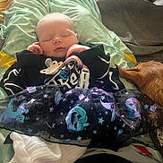 Amyra joined the competition — help win amazing prizes! baby, sleeping, blanket, dog, pacifier, clothing, person, indoor, cute, resting, pet, skirt, pattern, hand, head, cozy, fur, animal, peaceful, relaxing
