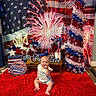 american_flag, anniversary, baby, beads, celebration, child, colorful, decoration, festive, fireworks, floor, happy, holiday, indoor, patriotic, portrait, red_rug, sitting, table, toy