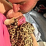 baby, newborn, man, kiss, pacifier, leopard_print, clothing, holding, closeup, intimacy, love, family, indoor, portrait, skin, cute, sleeping, resting, affection, tenderness