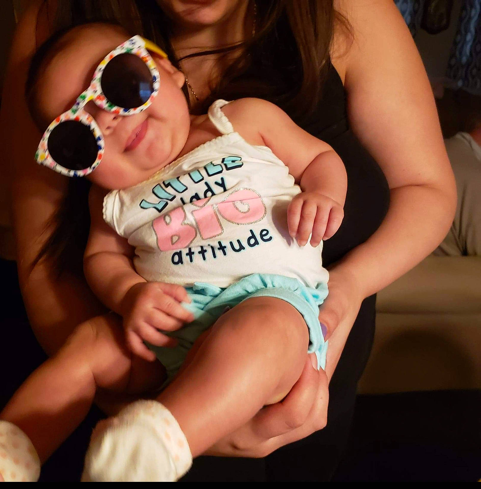 Aubriella is registered to the contest to win money with this photo: abdomen, baby, cheek, chest, eyewear, face, finger, gesture, glasses, goggles, happy, leg, muscle, person, skin, sunglasses, thigh, thumb, toddler, trunk