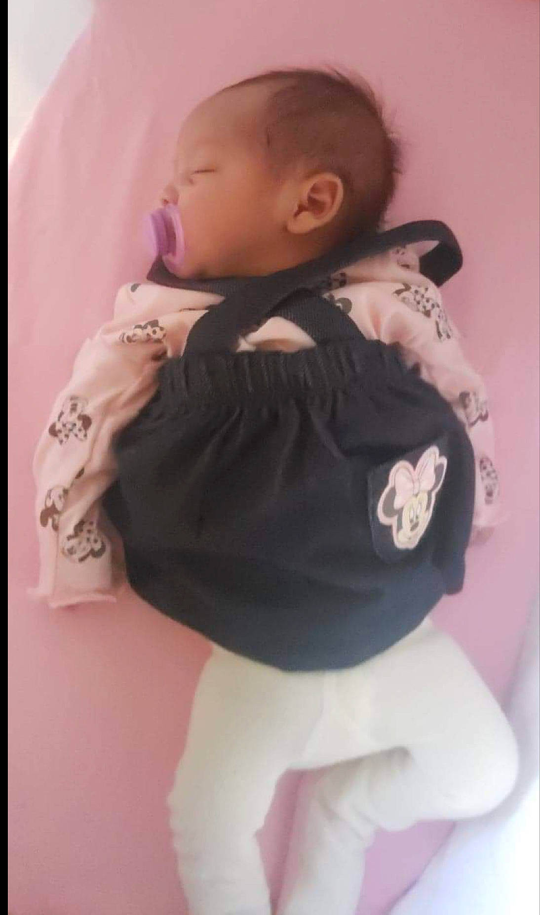 Aubriella is registered to the contest to win money with this photo: abdomen, baby, baby_products, baby_toddler_clothing, cheek, child, collar, comfort, face, finger, head, pattern, person, pink, sitting, skin, sleeve, t_shirt, thumb, toddler