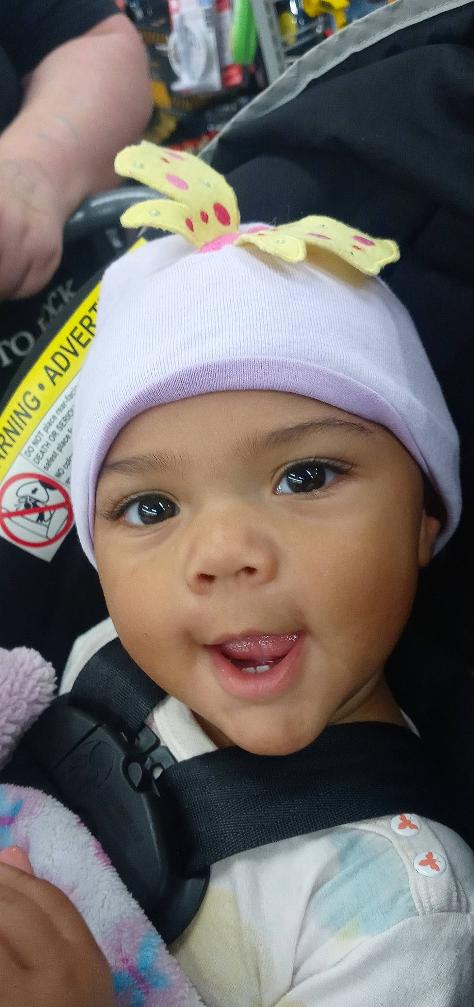 Cheyanne joined the competition — help win amazing prizes! baby, cap, cheek, child, close_up, cool, eyebrow, eyelash, happy, headgear, headwear, helmet, knit_cap, lip, magenta, nose, person, pink, skin, smile