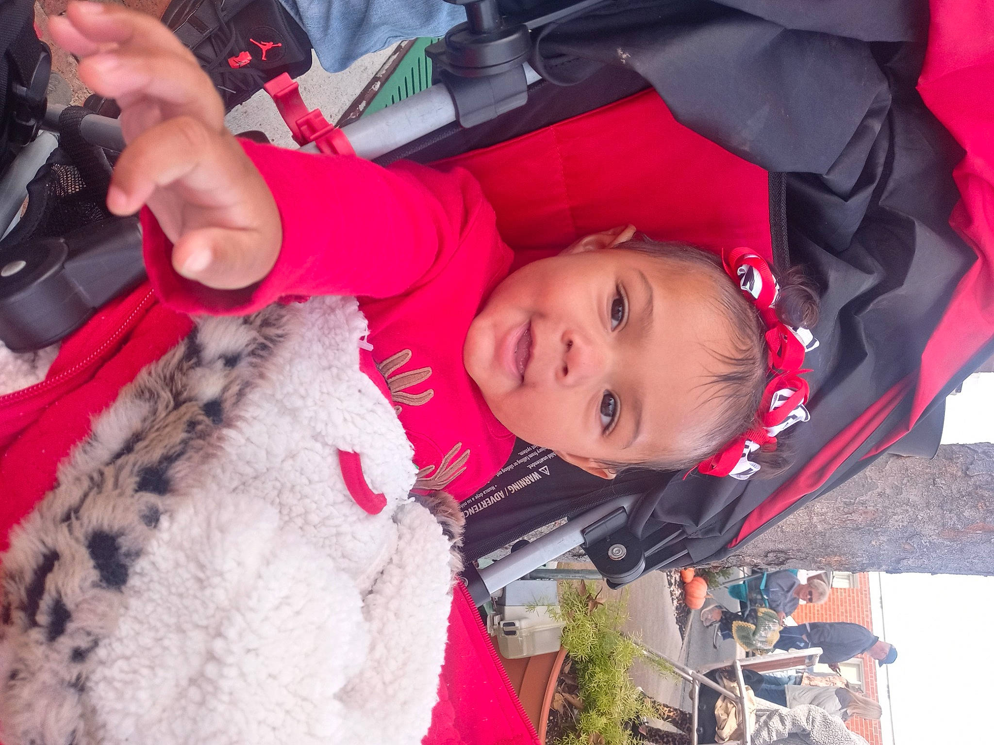 Cheyanne joined the competition — help win amazing prizes! baby, baby_products, camera, carmine, child, fun, fur, headgear, jacket, magenta, person, plant, recreation, red, single_lens_reflex_camera, skin, smile, tire, toddler, tree
