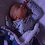 Elvis is registered to the contest to win money with this photo: baby, sleeping, pajamas, blanket, cozy, infant, child, soft, purple, bedtime, cute, peaceful, face, hand, portrait, newborn, comfort, rest, warm, snuggled